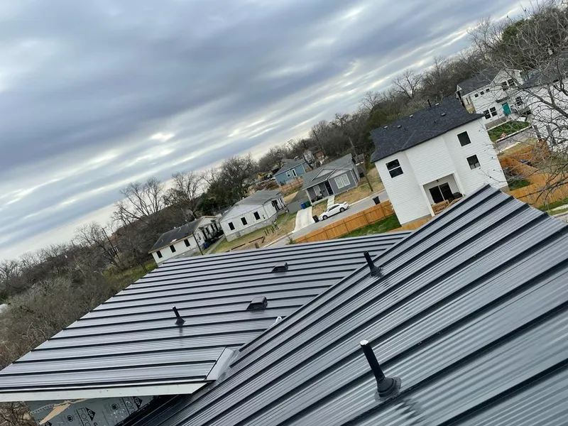 Standing seam metal roof panels with vents for Skylight Repair in Homestead Meadows North